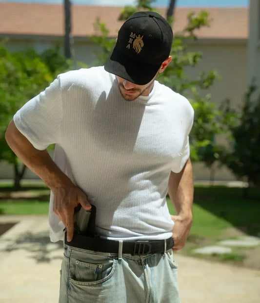 Black MRA-IL Ratchet belt with moderate stiffness, 150cm length, shown in a full view with buckle and textured leather strap.